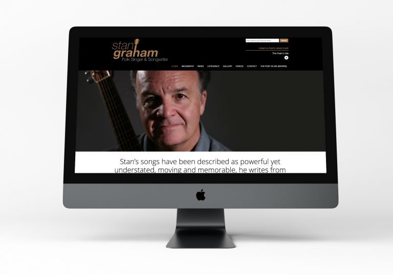 A computer showing the home page design for Stan Graham, singer songwriter's website