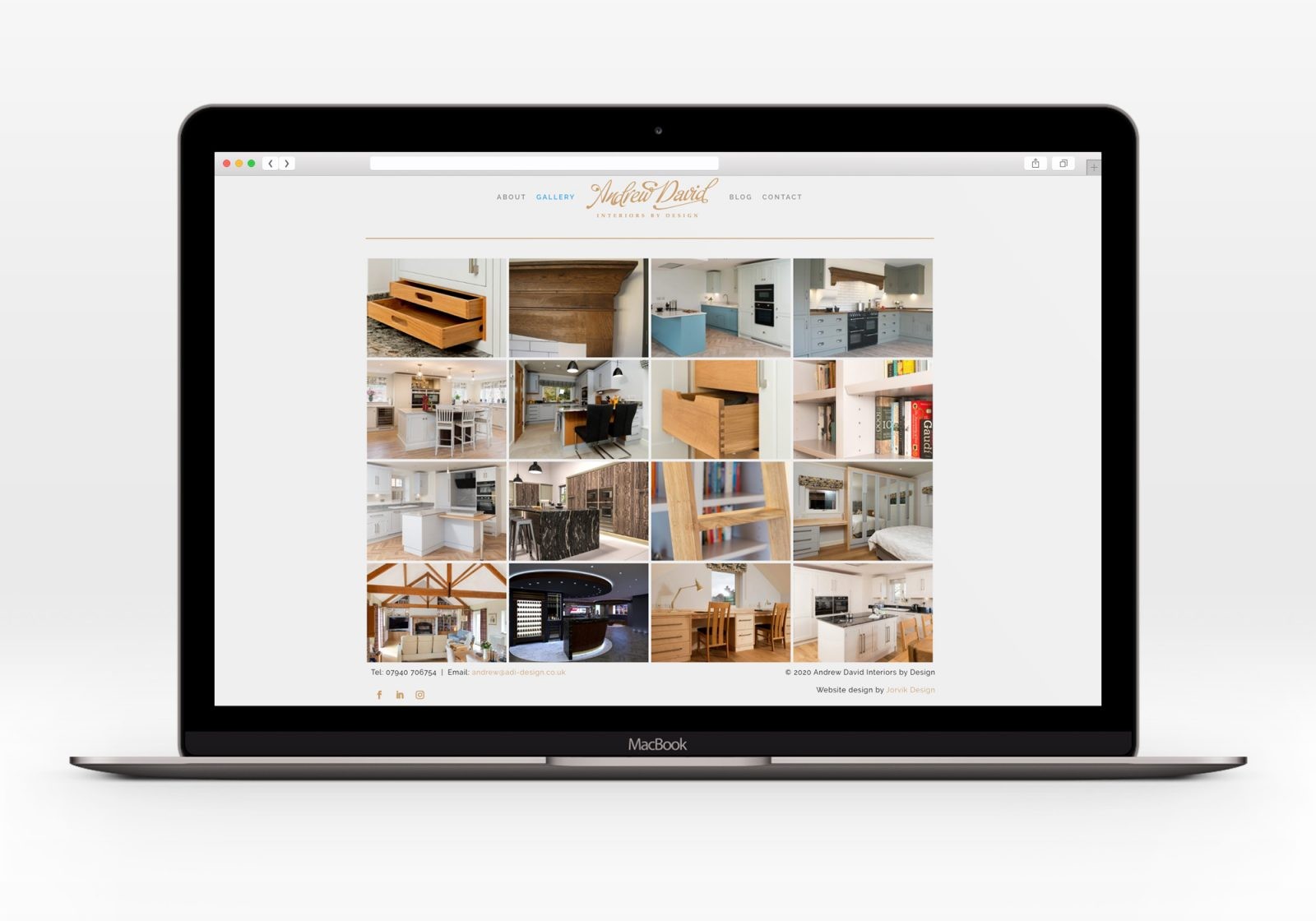Andrew David Interiors by Design website shown on a laptop computer